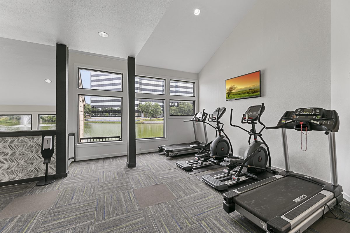 Cardio Room with Lake Views at Lakeside Apartments